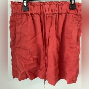 Women’s orange skirt with pockets